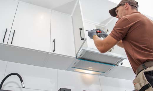 White Cabinets Being Installed